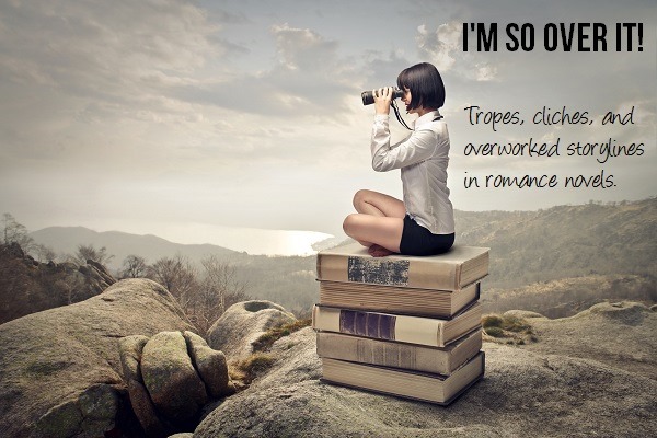 beautiful woman sitting on a pile of old books watching with binoculars